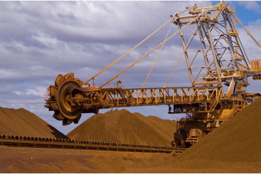 Iron mine with a tractor drill mining for iron